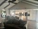 Open concept living area with kitchen featuring granite counters, stainless steel appliances and wood floors at 5537 E Drummer Ave, Mesa, AZ 85206