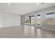 Spacious living room with tile flooring and ample natural light at 5619 N 193Rd Ave, Litchfield Park, AZ 85340