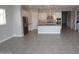 Expansive open concept layout seamlessly connects the living area with the kitchen at 5619 N 193Rd Ave, Litchfield Park, AZ 85340