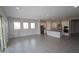 Spacious open concept living area with direct access to the modern kitchen at 5619 N 193Rd Ave, Litchfield Park, AZ 85340