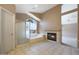 Bright bathroom with a soaking tub, separate shower, and cozy fireplace at 5959 W Lone Cactus Dr, Glendale, AZ 85308