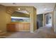 Second-floor hallway with built-in wooden cabinetry and beige carpet at 5959 W Lone Cactus Dr, Glendale, AZ 85308