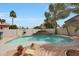 Private pool area features lush landscaping and a soothing waterfall feature at 5959 W Lone Cactus Dr, Glendale, AZ 85308