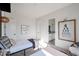 Bright and modern bedroom with two twin beds and view into ensuite bathroom at 6108 E Shasta Daisy Ln, Prescott Valley, AZ 86315