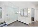 Modern bathroom featuring a glass shower, dual vanity, and contemporary fixtures at 630 S Boulder Ct, Gilbert, AZ 85296