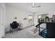 Bright bedroom with carpet, a ceiling fan, a bunk bed with a slide, a desk, and ample natural light at 630 S Boulder Ct, Gilbert, AZ 85296