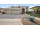 Stunning two-story home with a three-car garage, meticulously landscaped front yard, and charming curb appeal at 630 S Boulder Ct, Gilbert, AZ 85296