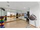 Bright gym with free weights, workout equipment and a large mirrored wall at 6803 E Main St # 1106, Scottsdale, AZ 85251