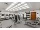 Spacious gym featuring treadmills, weight machines, free weights, and a well-lit exercise area at 6803 E Main St # 1106, Scottsdale, AZ 85251
