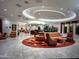 Elegant lobby featuring seating areas, reception desk, plants, and decorative lighting at 6803 E Main St # 1106, Scottsdale, AZ 85251