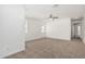 Bright bedroom with neutral carpet, ceiling fan, recessed lighting, and multiple windows for ample natural light at 7138 W Kent Dr, Chandler, AZ 85226