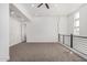 An upstairs bonus room features recessed lighting and neutral walls and flooring at 7138 W Kent Dr, Chandler, AZ 85226