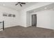 An upstairs bonus room features recessed lighting and neutral walls and flooring at 7138 W Kent Dr, Chandler, AZ 85226