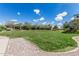 Well-maintained community lawn surrounded by mature trees and landscaping at 7138 W Kent Dr, Chandler, AZ 85226
