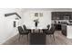 Bright dining room with a marble table, stylish chairs, and modern finishes, perfect for Gathering gatherings at 7138 W Kent Dr, Chandler, AZ 85226