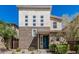 Modern home featuring mixed textures, a stylish entrance, and tidy landscaping creating eye-catching curb appeal at 7138 W Kent Dr, Chandler, AZ 85226