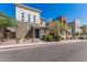 Street view of modern two-story home with brick and stucco exterior, xeriscaping and contemporary architecture at 7138 W Kent Dr, Chandler, AZ 85226