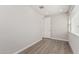 Bright home office featuring gray walls, recessed lighting, and sleek, wood-look flooring at 7138 W Kent Dr, Chandler, AZ 85226