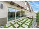 Back of house featuring a private backyard with modern landscaping and cozy seating area at 7330 E Vista Bonita Dr, Scottsdale, AZ 85255