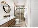Modern bathroom with stylish vanity, tiled walk-in shower, and updated fixtures at 7670 E Sierra Vista Dr, Scottsdale, AZ 85250