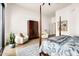 Bright bedroom with hardwood floors, a cozy sitting area, and lots of natural light at 7670 E Sierra Vista Dr, Scottsdale, AZ 85250