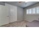 Bedroom with large closet, white shutters and wood-look floors at 8319 E Indianola Ave, Scottsdale, AZ 85251