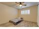 Cozy bedroom featuring a shuttered window, neutral paint, and stylish flooring, providing a serene escape at 8319 E Indianola Ave, Scottsdale, AZ 85251