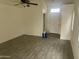 Bright living room featuring stylish tile flooring and neutral walls at 8349 W Holly St, Phoenix, AZ 85037