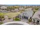 Stunning aerial view of a well-manicured home featuring a paver driveway and lush green lawn at 851 E Deer Creek Rd, Phoenix, AZ 85048