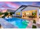 Stunning pool area with seamless indoor-outdoor living through a large sliding glass door at 851 E Deer Creek Rd, Phoenix, AZ 85048