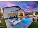 Gorgeous pool, outdoor kitchen, and patio, perfect for luxurious outdoor living at 851 E Deer Creek Rd, Phoenix, AZ 85048