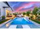 Resort-style pool with tanning deck and water feature adjacent to outdoor living space at 851 E Deer Creek Rd, Phoenix, AZ 85048