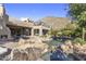 Inviting backyard pool featuring rock accents and a scenic mountain view creates a private oasis at 10040 E Happy Valley Rd # 479, Scottsdale, AZ 85255