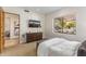Contemporary bedroom with desert view, modern furniture, and en-suite access at 10040 E Happy Valley Rd # 479, Scottsdale, AZ 85255