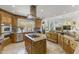 Well-appointed kitchen with custom cabinetry, granite countertops, and scenic views of the outdoors at 10040 E Happy Valley Rd # 479, Scottsdale, AZ 85255
