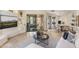 Well-lit living room with sliding doors to the patio, seamlessly connecting indoor and outdoor spaces at 10040 E Happy Valley Rd # 479, Scottsdale, AZ 85255