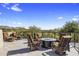 Outdoor living space with a fire pit, comfortable seating, and scenic mountain views at 10040 E Happy Valley Rd # 479, Scottsdale, AZ 85255