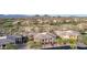 Aerial view of real estate showcasing desert landscaping and mountain views at 10260 E White Feather Ln # 1022, Scottsdale, AZ 85262