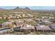 Scenic aerial view of Desert Highlands properties with desert landscaping and mountain views at 10260 E White Feather Ln # 1022, Scottsdale, AZ 85262