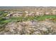 Aerial view overlooking Desert Highlands golf course surrounded by beautiful desert landscape at 10260 E White Feather Ln # 1022, Scottsdale, AZ 85262
