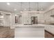 Kitchen island with granite countertop and stainless steel appliances, perfect for entertaining at 10260 E White Feather Ln # 1022, Scottsdale, AZ 85262