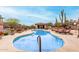 Community pool with lounge chairs and landscaped surroundings, offering a resort-style experience at 10260 E White Feather Ln # 1022, Scottsdale, AZ 85262