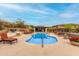 Community pool with lounge chairs and landscaped surroundings, offering a resort-style experience at 10260 E White Feather Ln # 1022, Scottsdale, AZ 85262