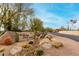 The Ridge at Troon North community entrance sign with desert landscaping and scenic surroundings at 10260 E White Feather Ln # 1022, Scottsdale, AZ 85262