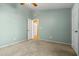Cozy bedroom with a ceiling fan and two closets at 10837 W Cottonwood Ln, Avondale, AZ 85392