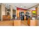 Kitchen with center island and stainless steel appliances, ample wooden cabinets and hardware at 10837 W Cottonwood Ln, Avondale, AZ 85392