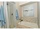 Modern bathroom boasting a separate shower and tub, complemented by designer tile and fixtures at 10939 N 111Th St, Scottsdale, AZ 85259