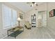 Bedroom features a vaulted ceiling, plantation shutters, and neutral decor at 10939 N 111Th St, Scottsdale, AZ 85259
