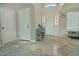 Inviting entryway with decorative front door and tile flooring at 10939 N 111Th St, Scottsdale, AZ 85259