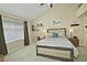 Inviting main bedroom featuring vaulted ceilings, soft lighting, and a comfortable king-sized bed at 10939 N 111Th St, Scottsdale, AZ 85259